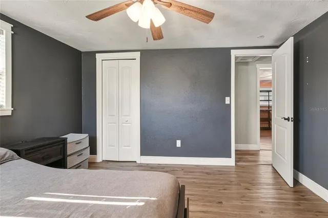 a view of a livingroom with wooden floor