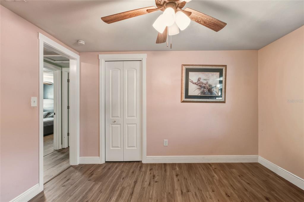3210 Decatur Avenue Lakeland, FL 33805 - Photo 22 of 37 a view of an empty room with wooden floor