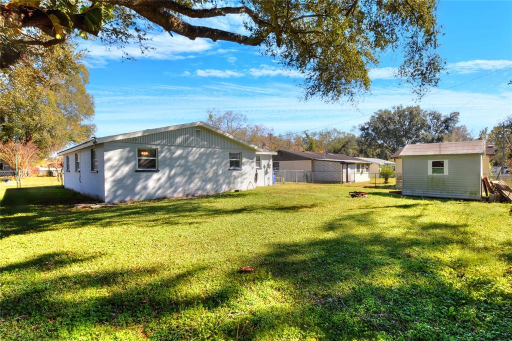 3210 Decatur Avenue Lakeland, FL 33805 - Photo 29 of 37 a swimming pool with trees in the background