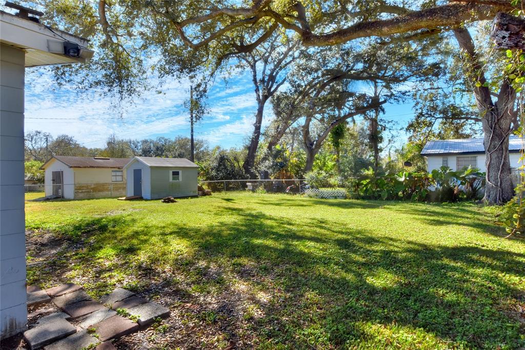 3210 Decatur Avenue Lakeland, FL 33805 - Photo 30 of 37 a view of a house with a yard