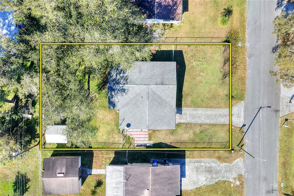 3210 Decatur Avenue Lakeland, FL 33805 - Photo 32 of 37 an aerial view of residential house with outdoor space