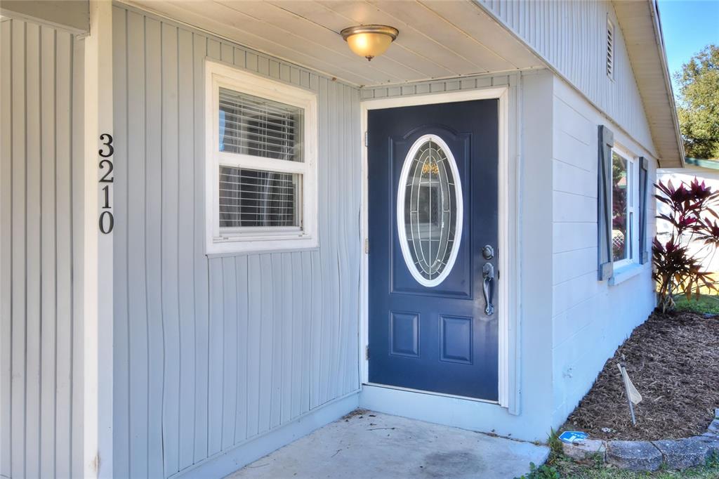 3210 Decatur Avenue Lakeland, FL 33805 - Photo 5 of 37 a front view of a house with entryway