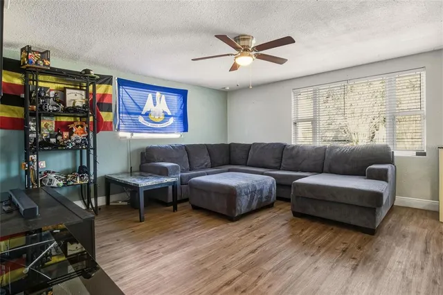 a living room with furniture and a window