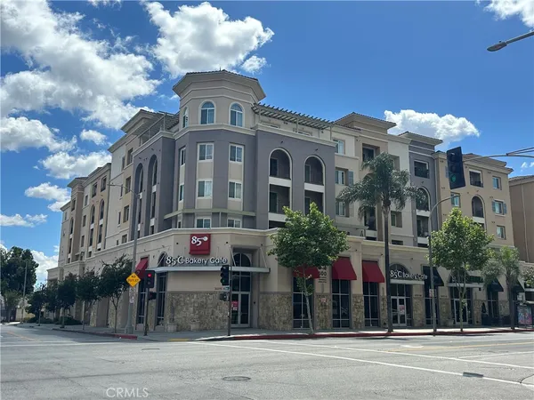 a front view of building with street