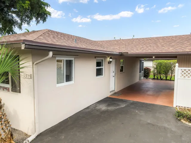 a view of a house with a garage
