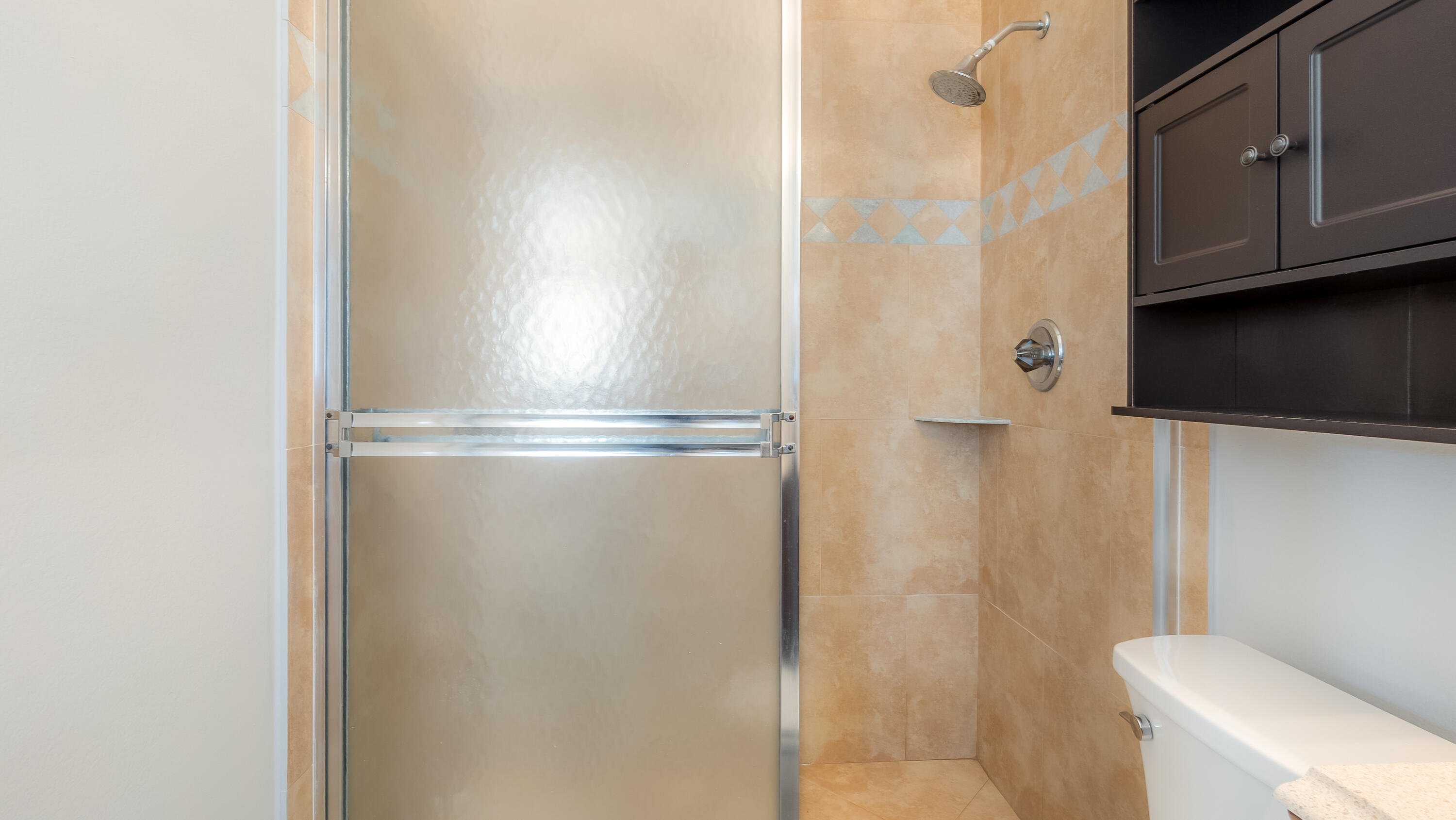 131 Mockingbird Lane Delray Beach, FL 33445 - Photo 24 of 29 a bathroom with a shower and a toilet