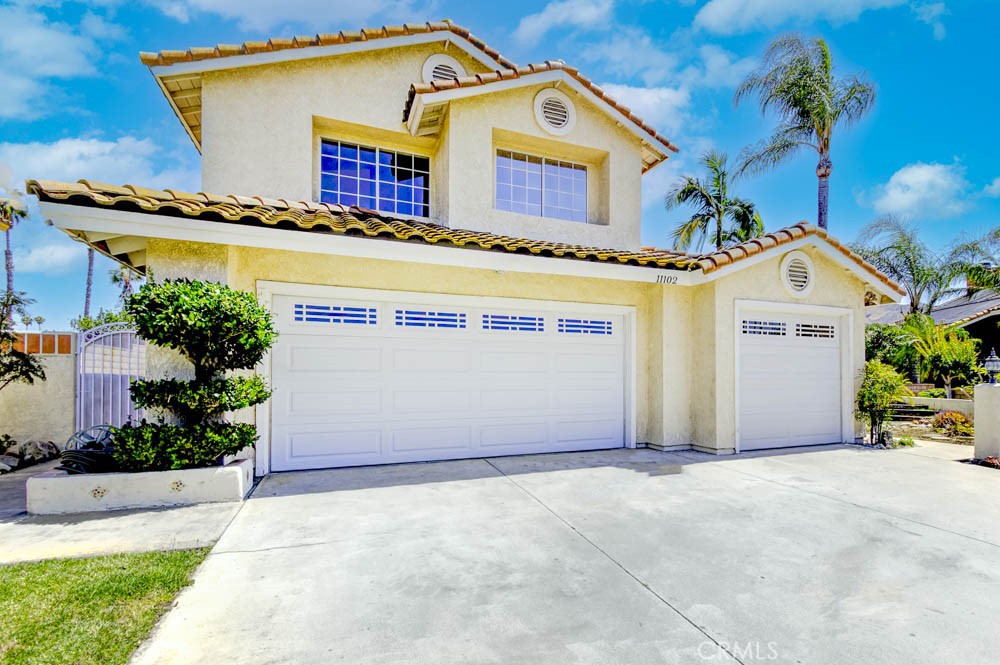 11102 Liverpool Lane Riverside, CA 92503 - Photo 4 of 58 Front of home with Driveway 1