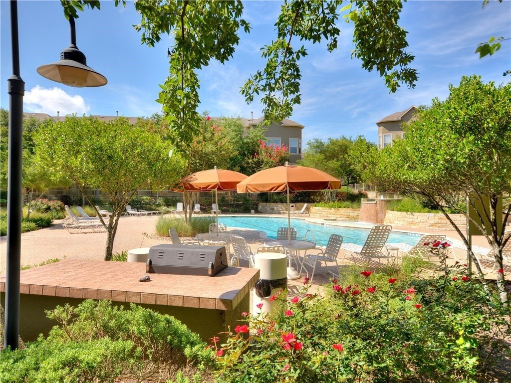 11203 Ranch Road 2222, Unit 302 Austin, TX 78732 - Photo 14 of 18 Community pool area with grill