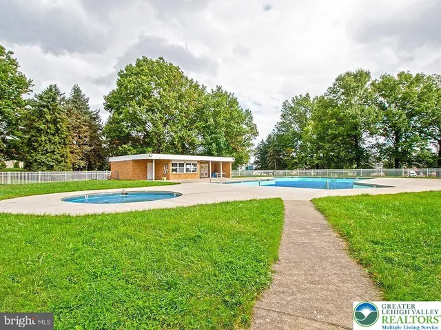 a view of a house with a swimming pool