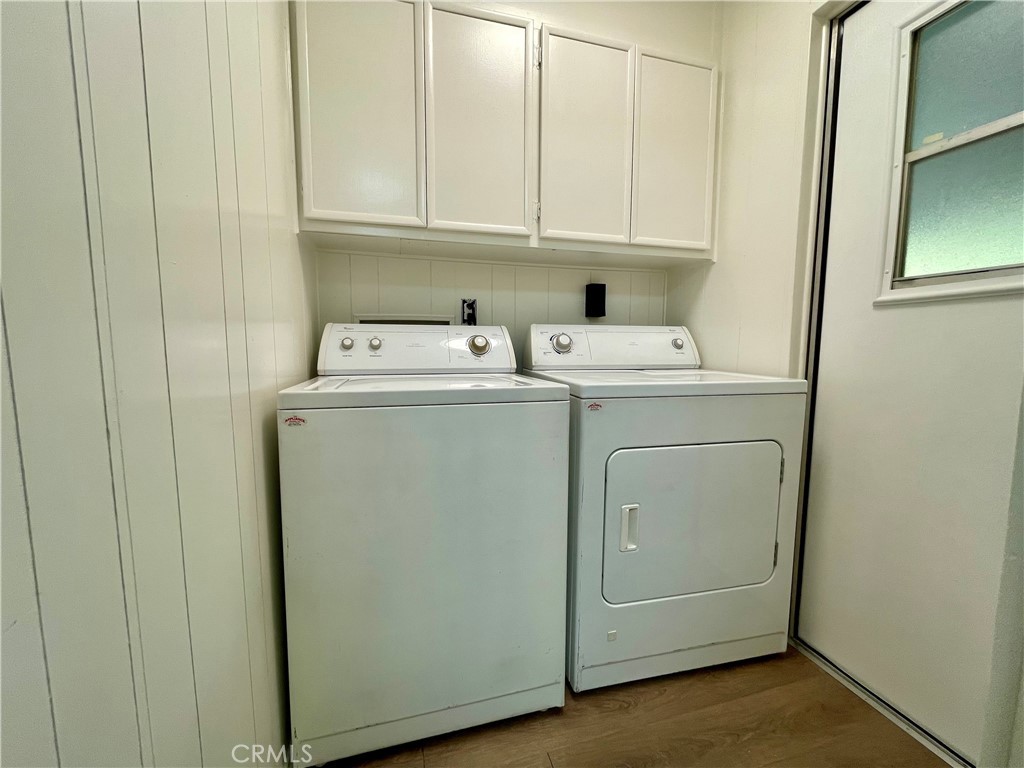 31130 South General Kearny Road, Unit 145 Temecula, CA 92591 - Photo 13 of 27 a view of storage and utility room with washer and dryer