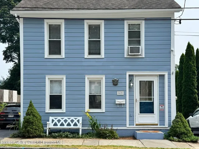 a view of brick building with many windows