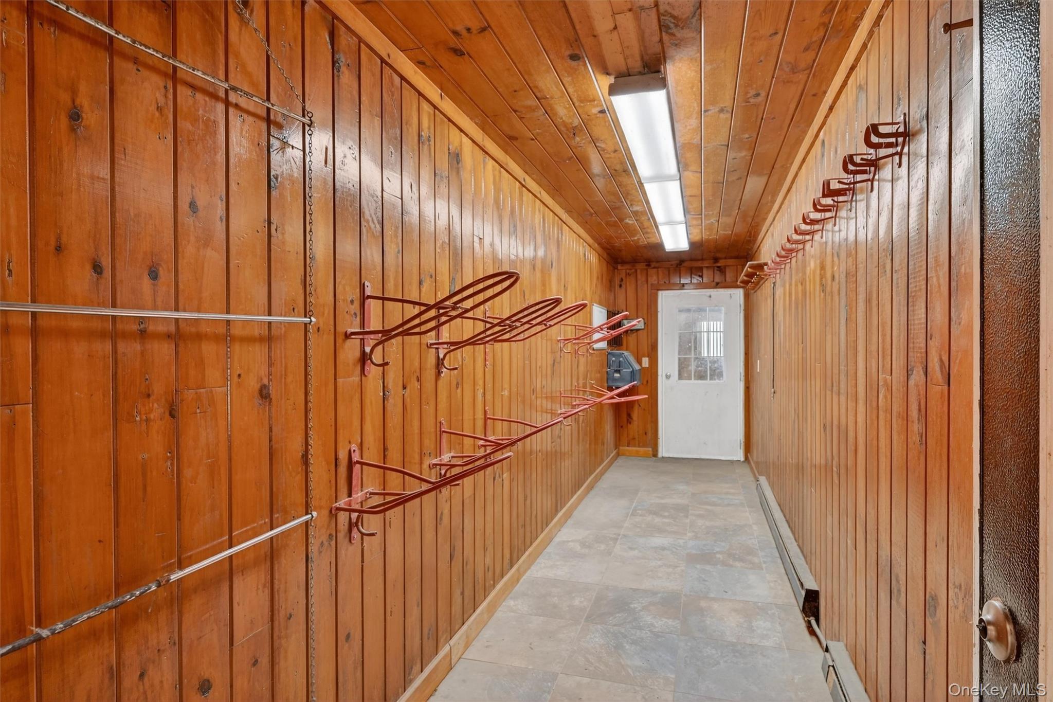 285 Hill Road Goshen, NY 10924 - Photo 38 of 49 Heated tack room in main barn is accessible from both barn aisles.