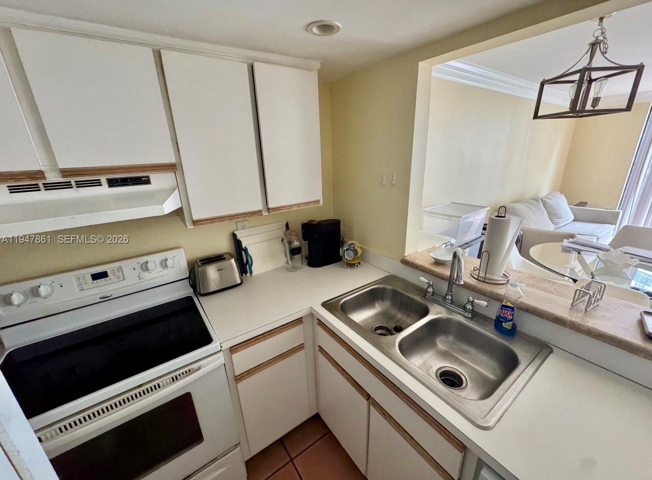 540 Brickell Key Drive, Unit 705 Miami, FL 33131 - Photo 15 of 38 a room with storage and utility