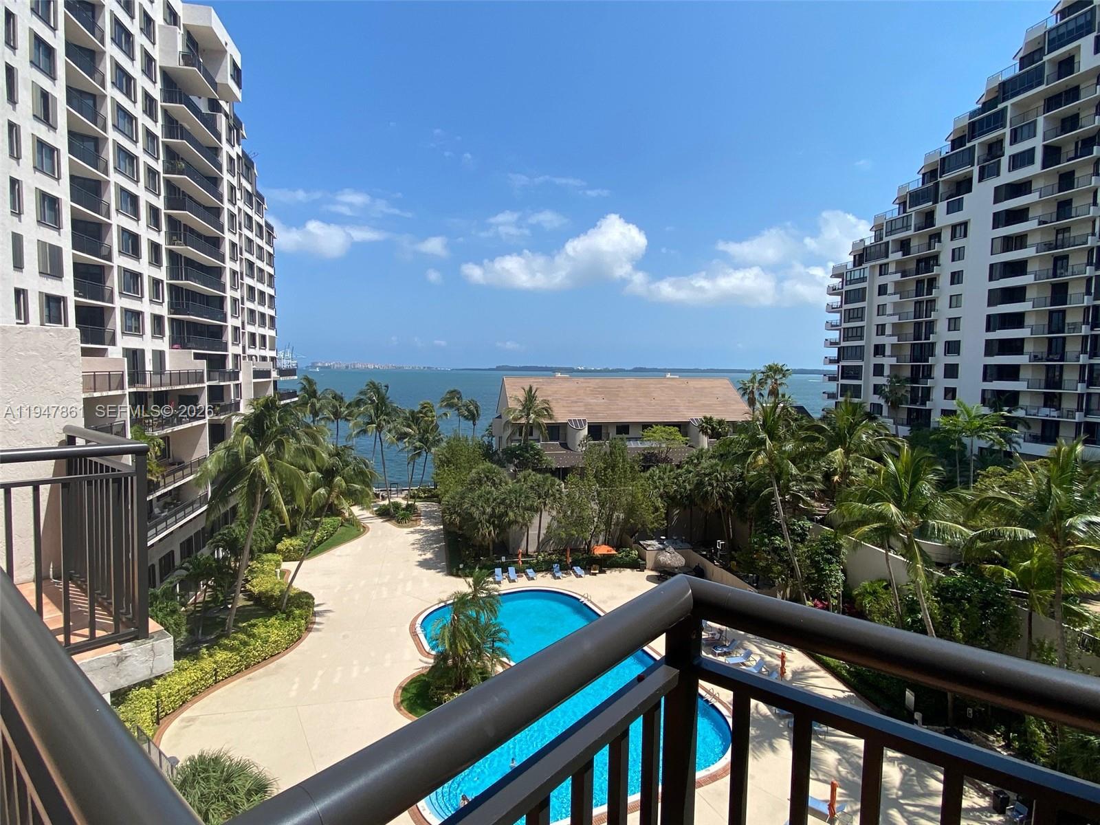 540 Brickell Key Drive, Unit 705 Miami, FL 33131 - Photo 2 of 38 a view of a balcony and lake view