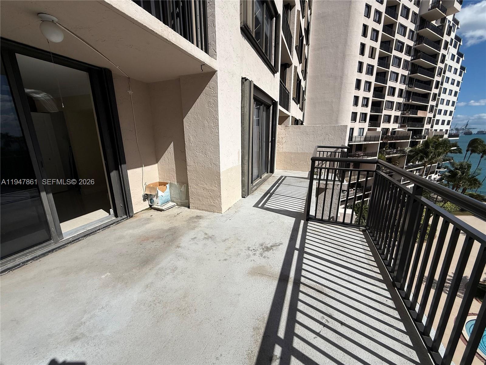 540 Brickell Key Drive, Unit 705 Miami, FL 33131 - Photo 37 of 38 a view of a balcony with chairs