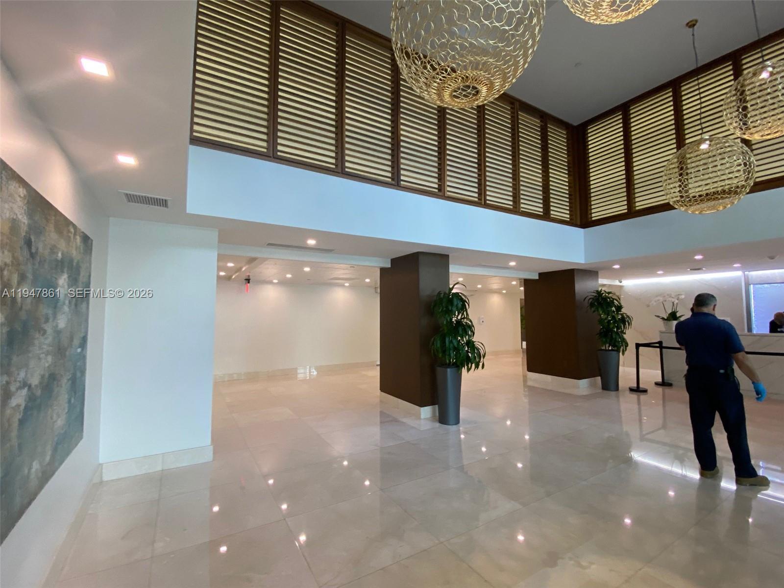 540 Brickell Key Drive, Unit 705 Miami, FL 33131 - Photo 5 of 38 a view of a lobby with entryway