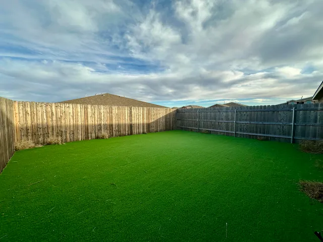 a view of yard with porch and outdoor space