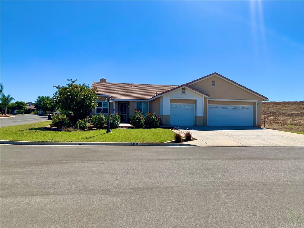24817 Butterchurn Road Wildomar, CA 92595 - Photo 1 of 39 No neighboring home to the left or to the right! Rare corner lot, on a unique culdesac with only one other home across the street. The HOA maintains the field next to the property. Lots like this are rare!!