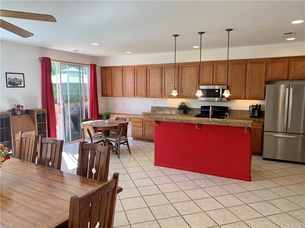 24817 Butterchurn Road Wildomar, CA 92595 - Photo 8 of 39 So much storage space in the kitchen! Bright with tons of natural sunlight.