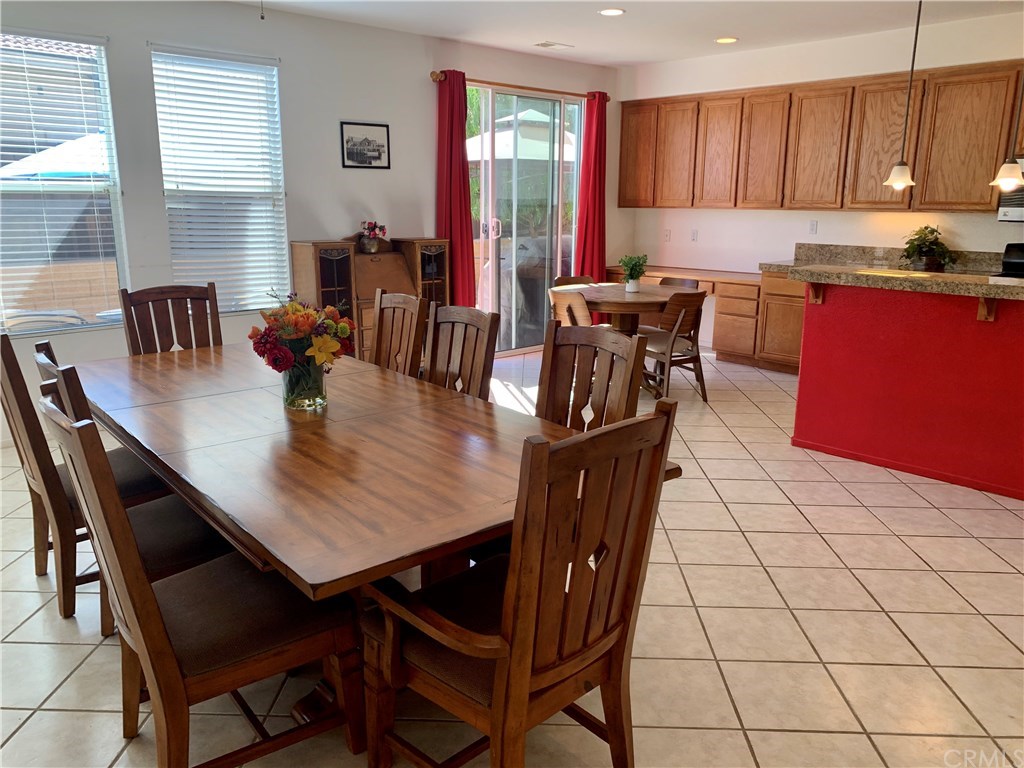 24817 Butterchurn Road Wildomar, CA 92595 - Photo 10 of 39 More space than they needed in this home! They used the family room as an extra-large dining room.