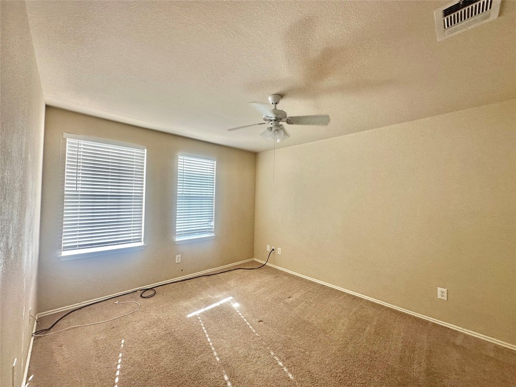 2624 Haselwood Lane Round Rock, TX 78665 - Photo 12 of 20 a view of an empty room with a window