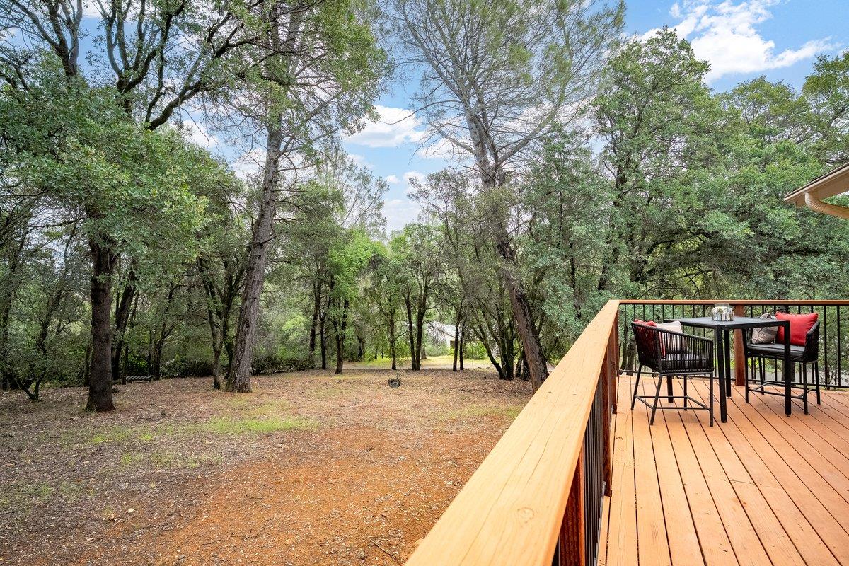 6561 Trinity Way Placerville, CA 95667 - Photo 56 of 58 a view of balcony with wooden floor and fence