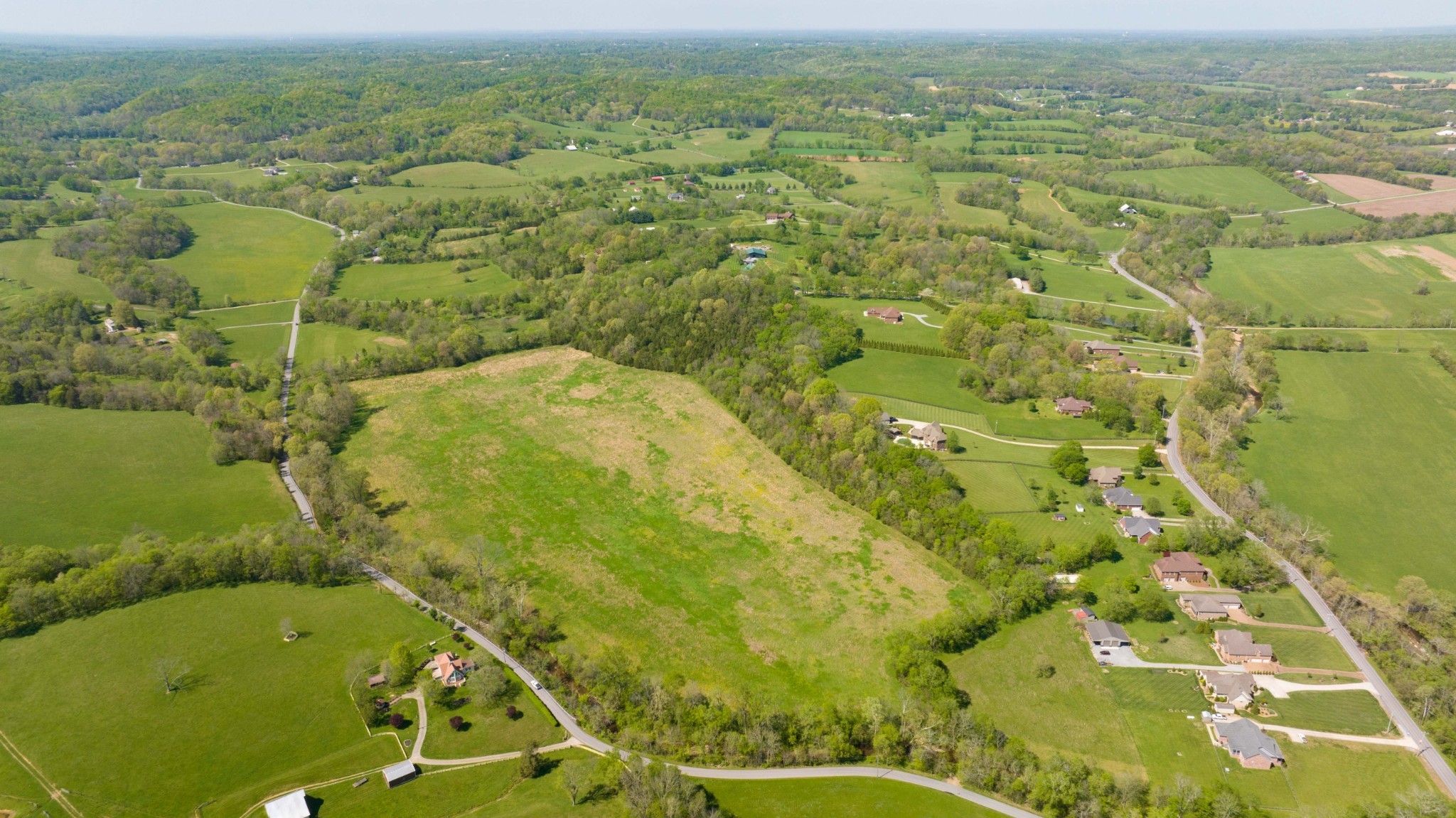 0 Pee Dee Branch Road Cottontown, TN 37048 - Photo 22 of 46 an aerial view of residential houses with outdoor space
