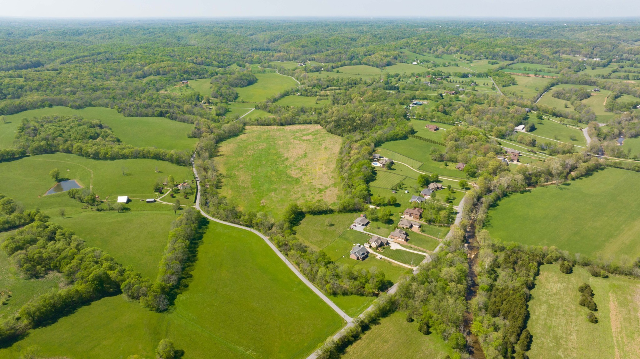 0 Pee Dee Branch Road Cottontown, TN 37048 - Photo 28 of 46 an aerial view of residential houses with outdoor space
