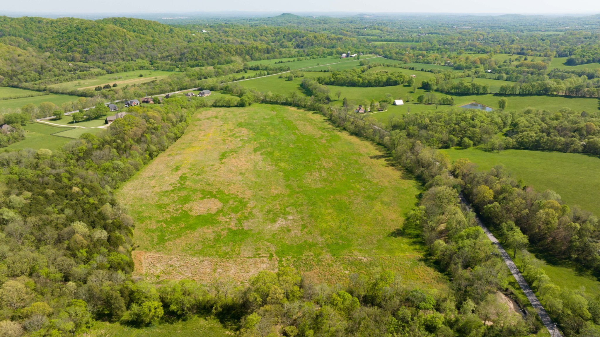0 Pee Dee Branch Road Cottontown, TN 37048 - Photo 35 of 46 a view of a city with lush green forest