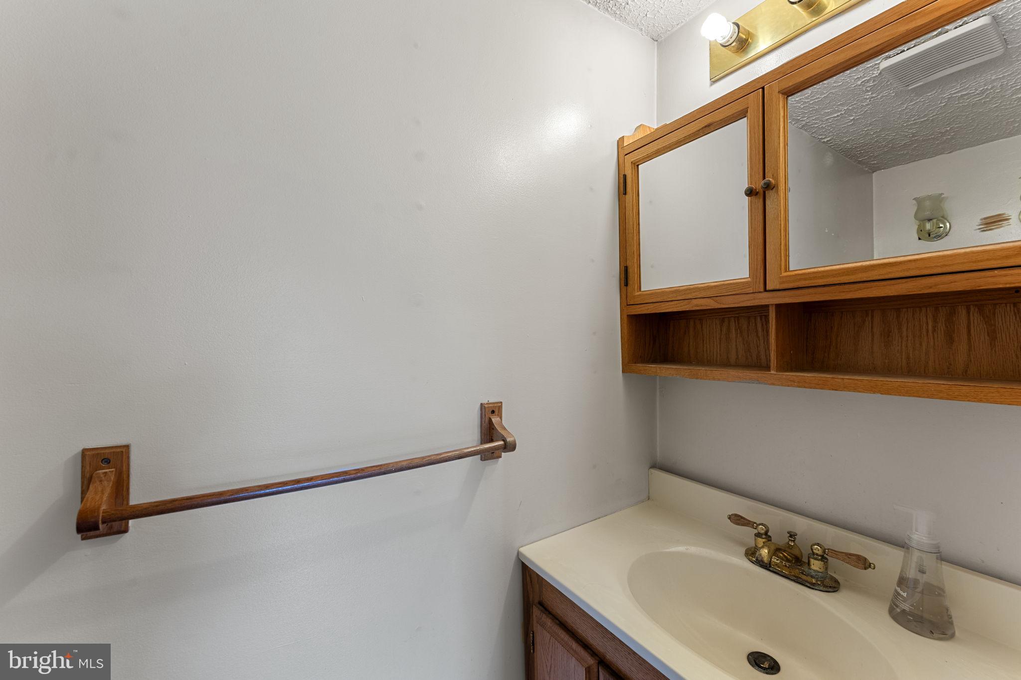 420 Russell Road Berryville, VA 22611 - Photo 34 of 60 Bright and functional bathroom space.