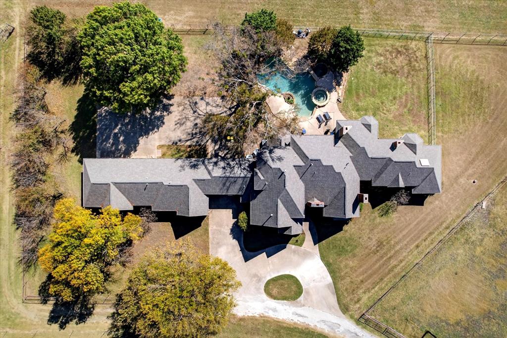 1500 Eden Ridge Celina, TX 75009 - Photo 2 of 40 an aerial view of a house with yard and seating space