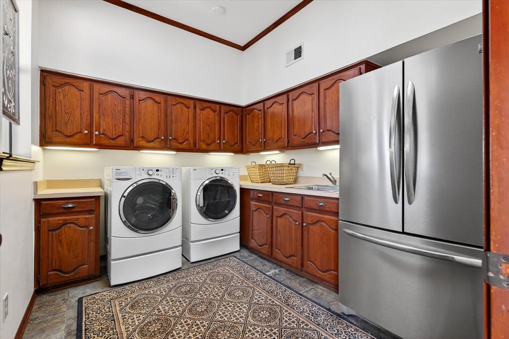 1500 Eden Ridge Celina, TX 75009 - Photo 22 of 40 a utility room with refrigerator and washer