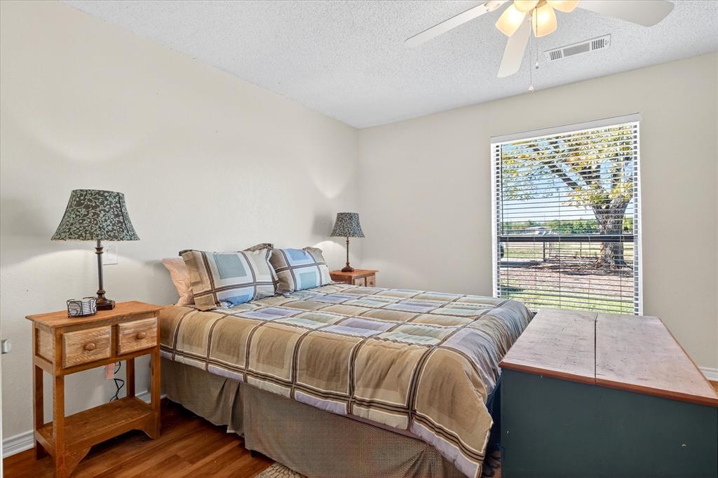 1500 Eden Ridge Celina, TX 75009 - Photo 28 of 40 a bedroom with a bed and a window