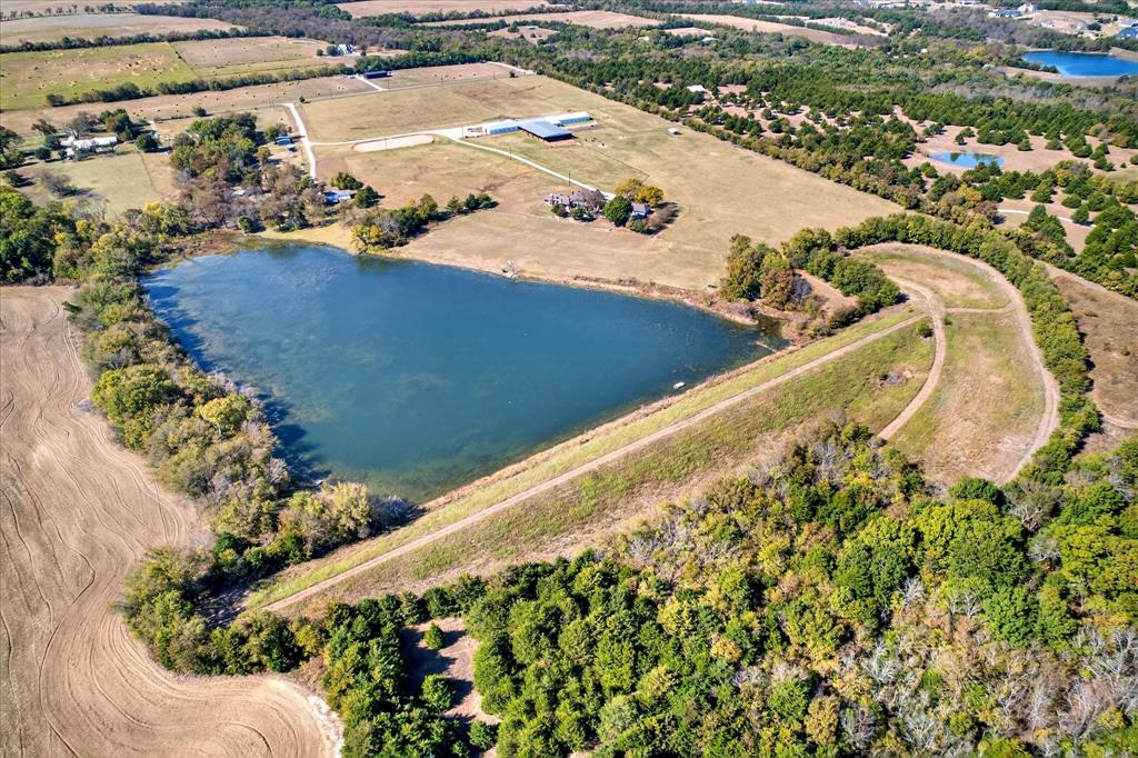1500 Eden Ridge Celina, TX 75009 - Photo 30 of 40 a view of a swimming pool with a yard