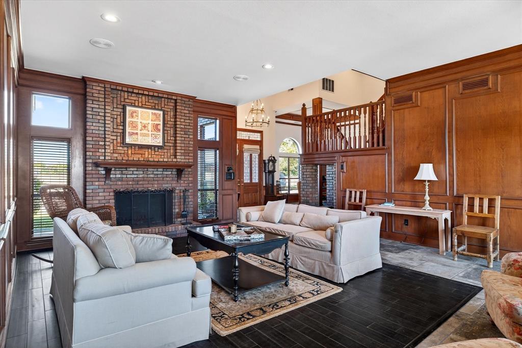 1500 Eden Ridge Celina, TX 75009 - Photo 6 of 40 a living room with furniture or couch and a fireplace