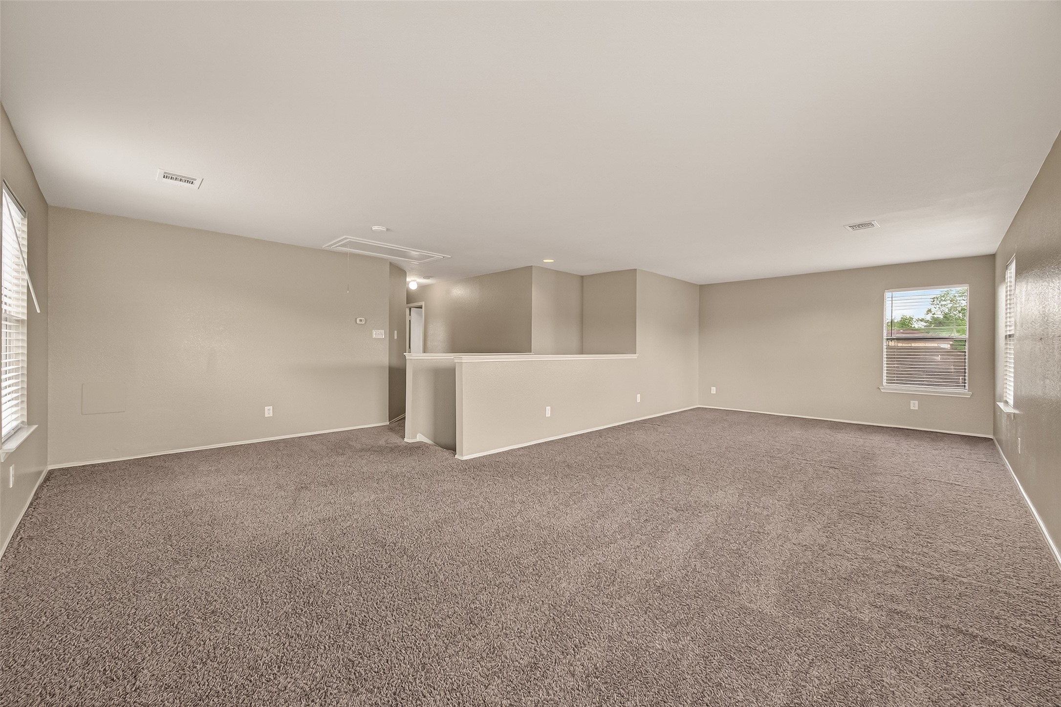 2918 Latch Lane Houston, TX 77038 - Photo 15 of 23 an empty room with windows