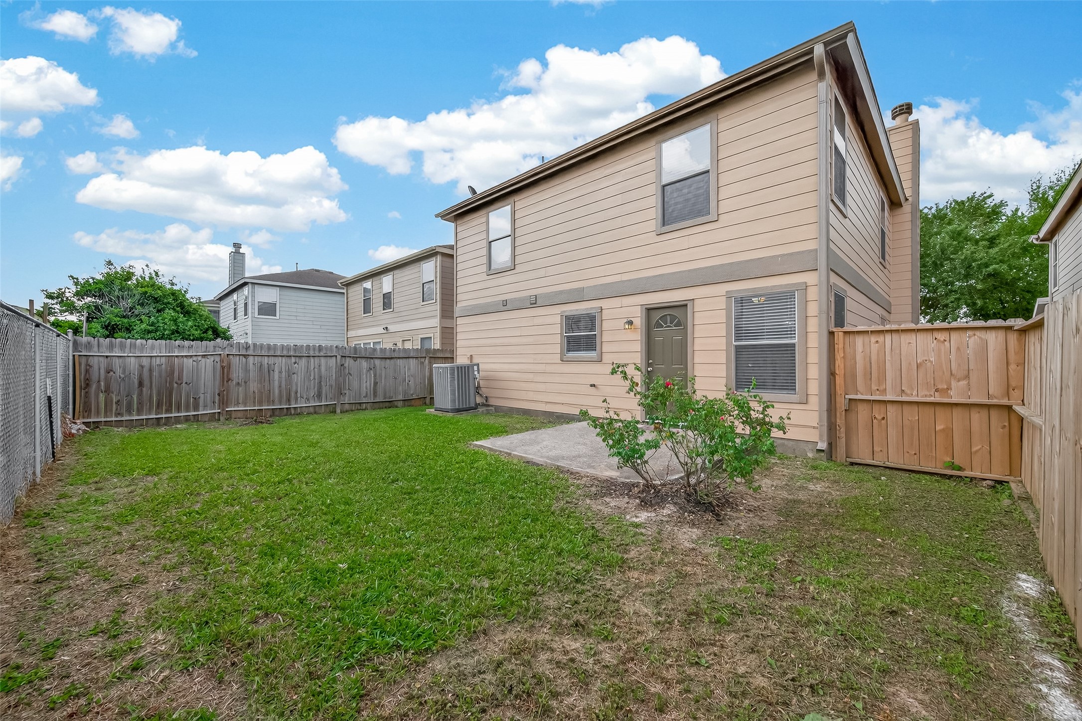 2918 Latch Lane Houston, TX 77038 - Photo 21 of 23 a view of a backyard with plants and a garden