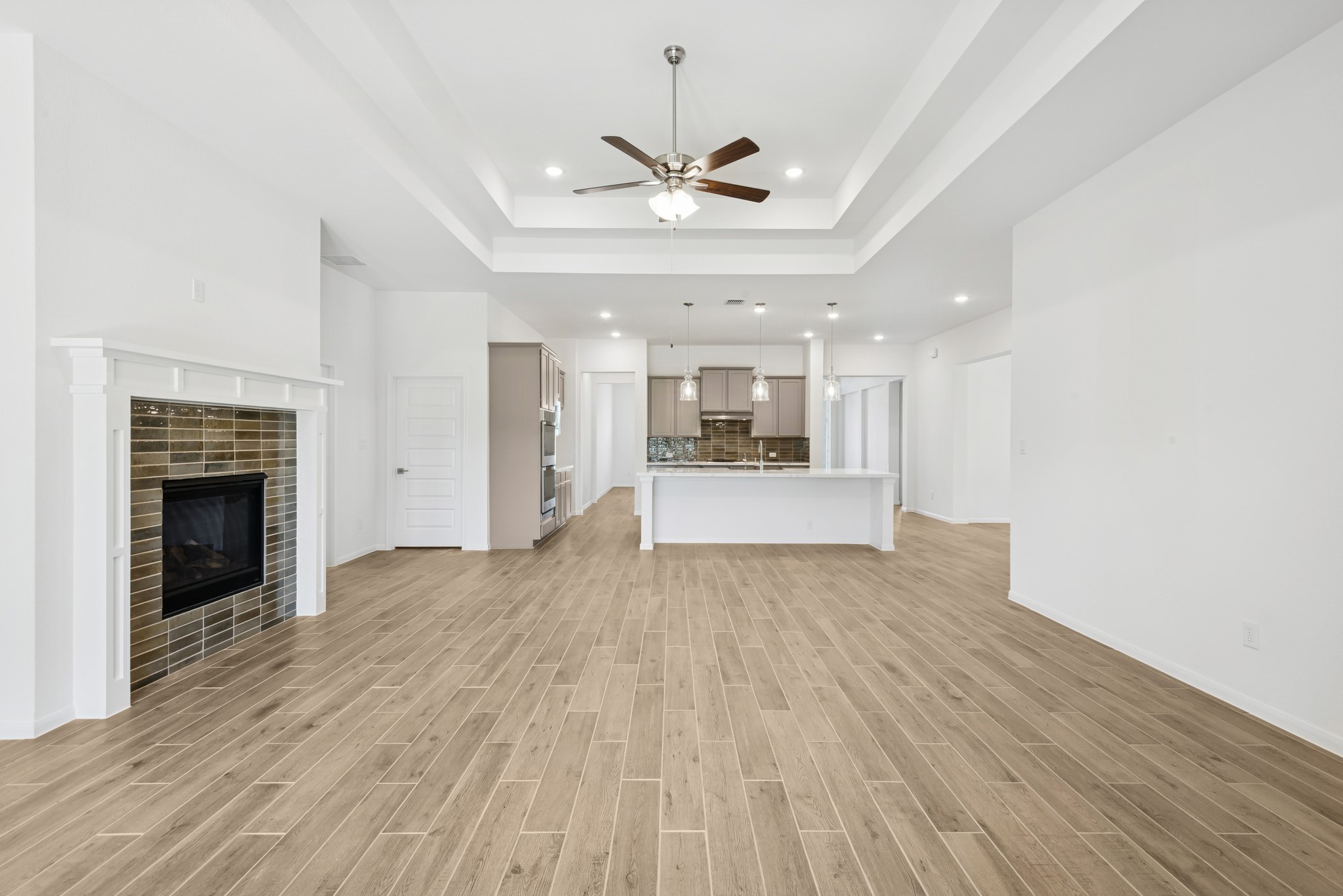 5017 Bluebell Way Waller, TX 77484 - Photo 9 of 23 Open great room (*Photo not of actual home and used for illustration purposes only.)