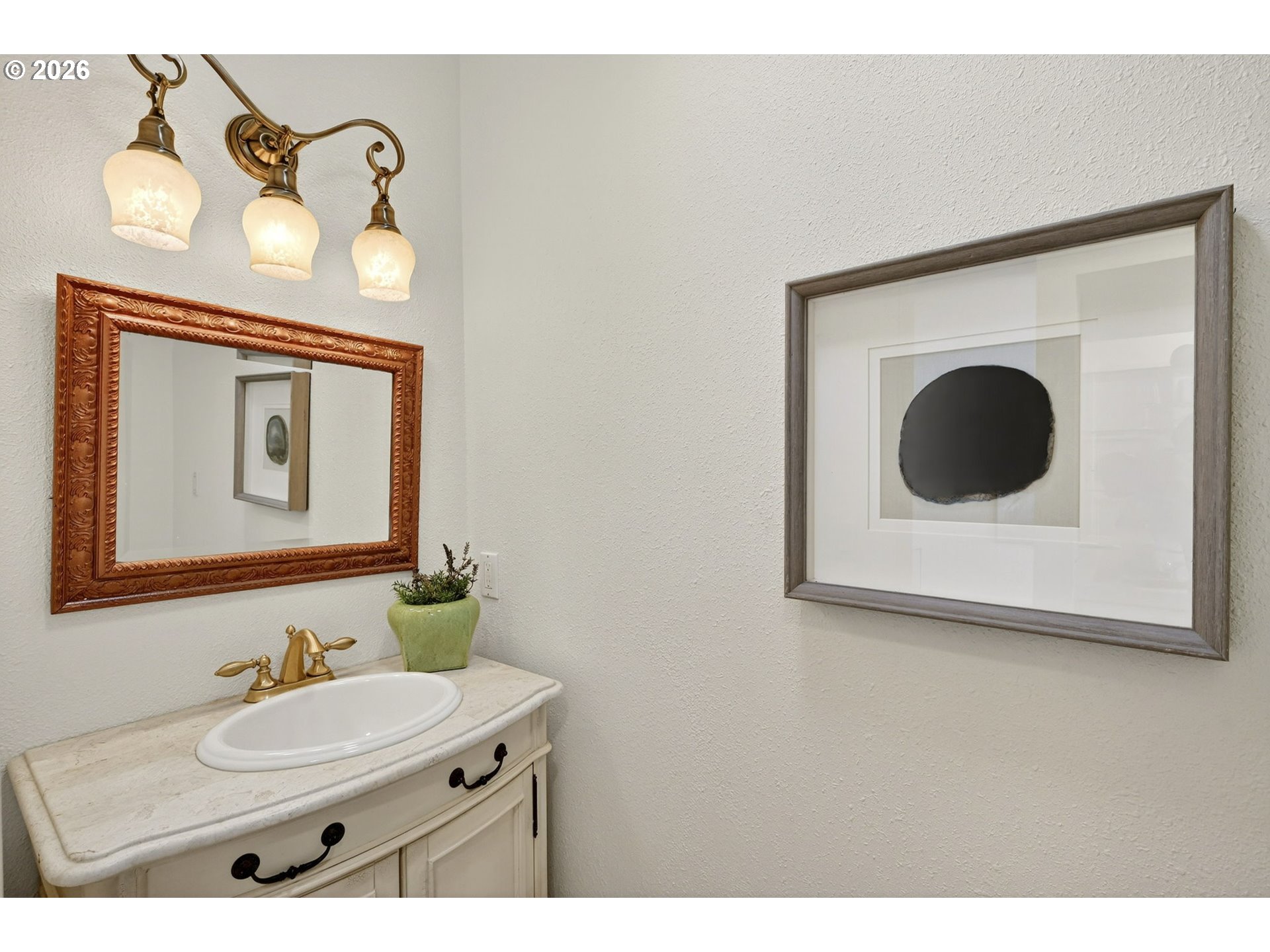 45 Southwest Condolea Court Lake Oswego, OR 97035 - Photo 15 of 23 a bathroom with a sink mirror and vanity