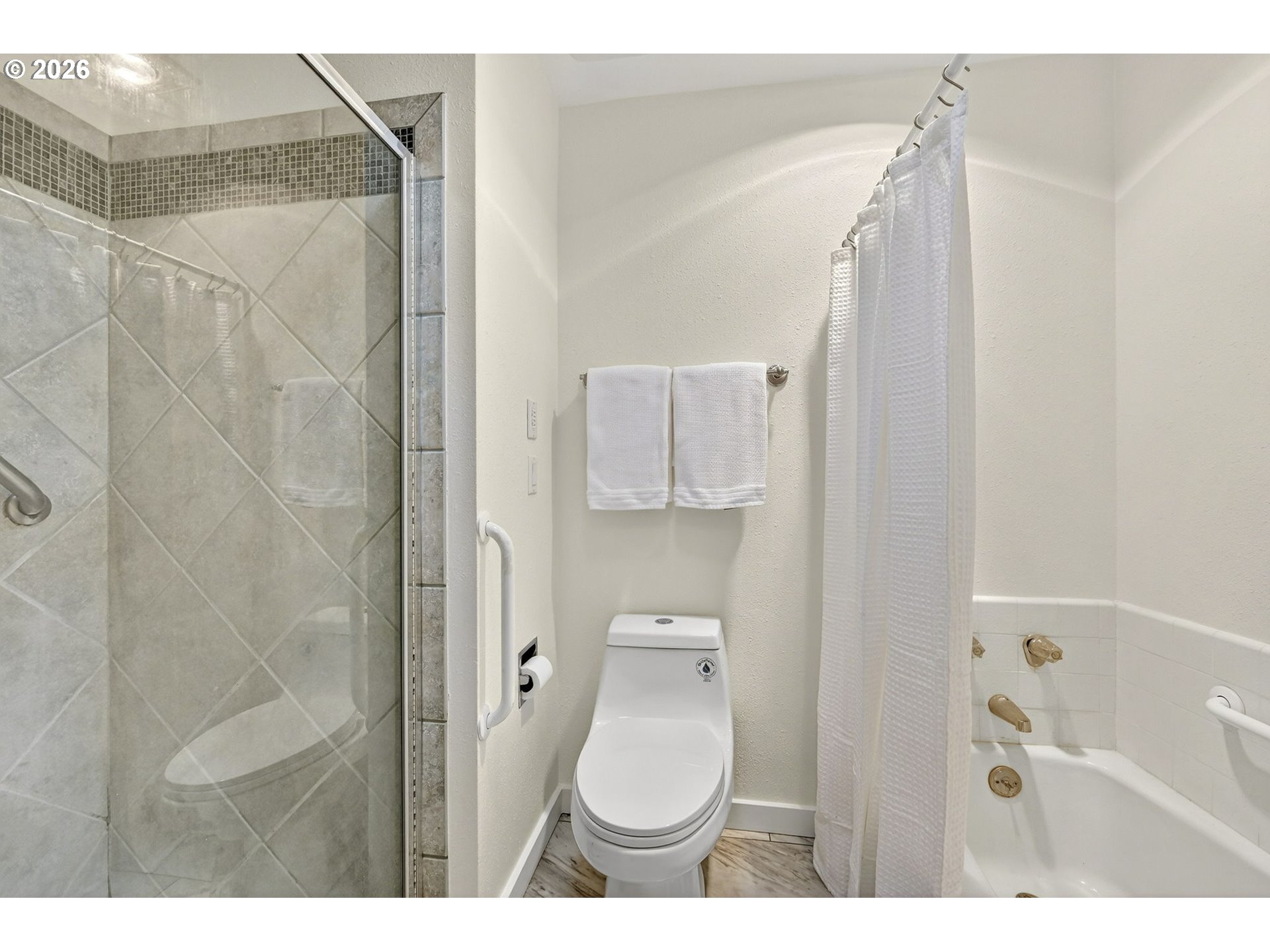 45 Southwest Condolea Court Lake Oswego, OR 97035 - Photo 18 of 23 a bathroom with a sink and toilet