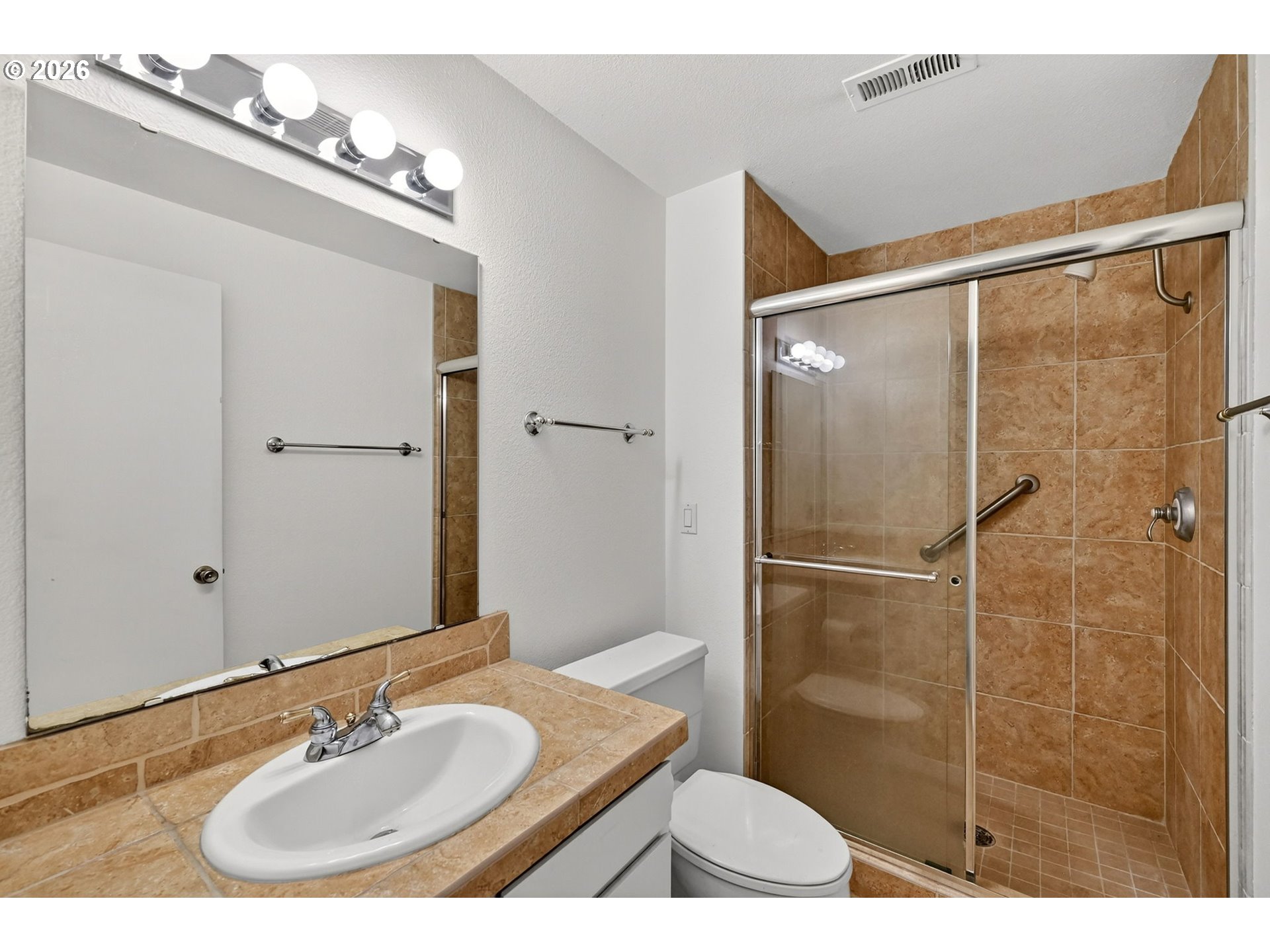 45 Southwest Condolea Court Lake Oswego, OR 97035 - Photo 20 of 23 a bathroom with a sink and mirror