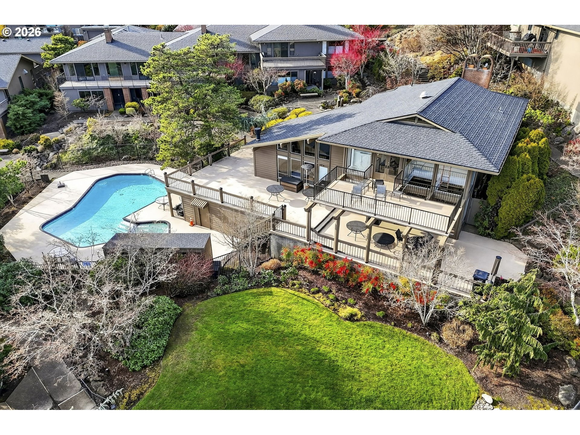 45 Southwest Condolea Court Lake Oswego, OR 97035 - Photo 23 of 23 an aerial view of a house with a garden