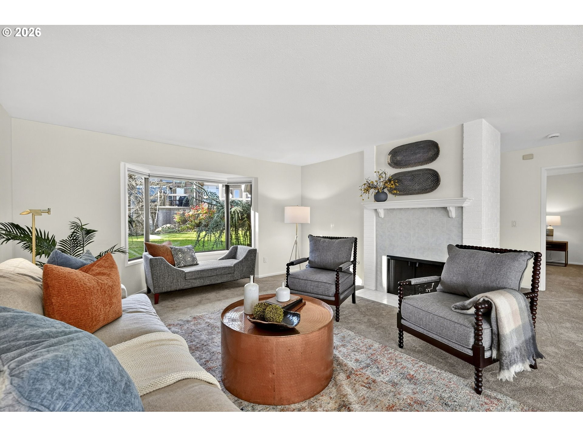 45 Southwest Condolea Court Lake Oswego, OR 97035 - Photo 5 of 23 a living room with furniture and a flat screen tv