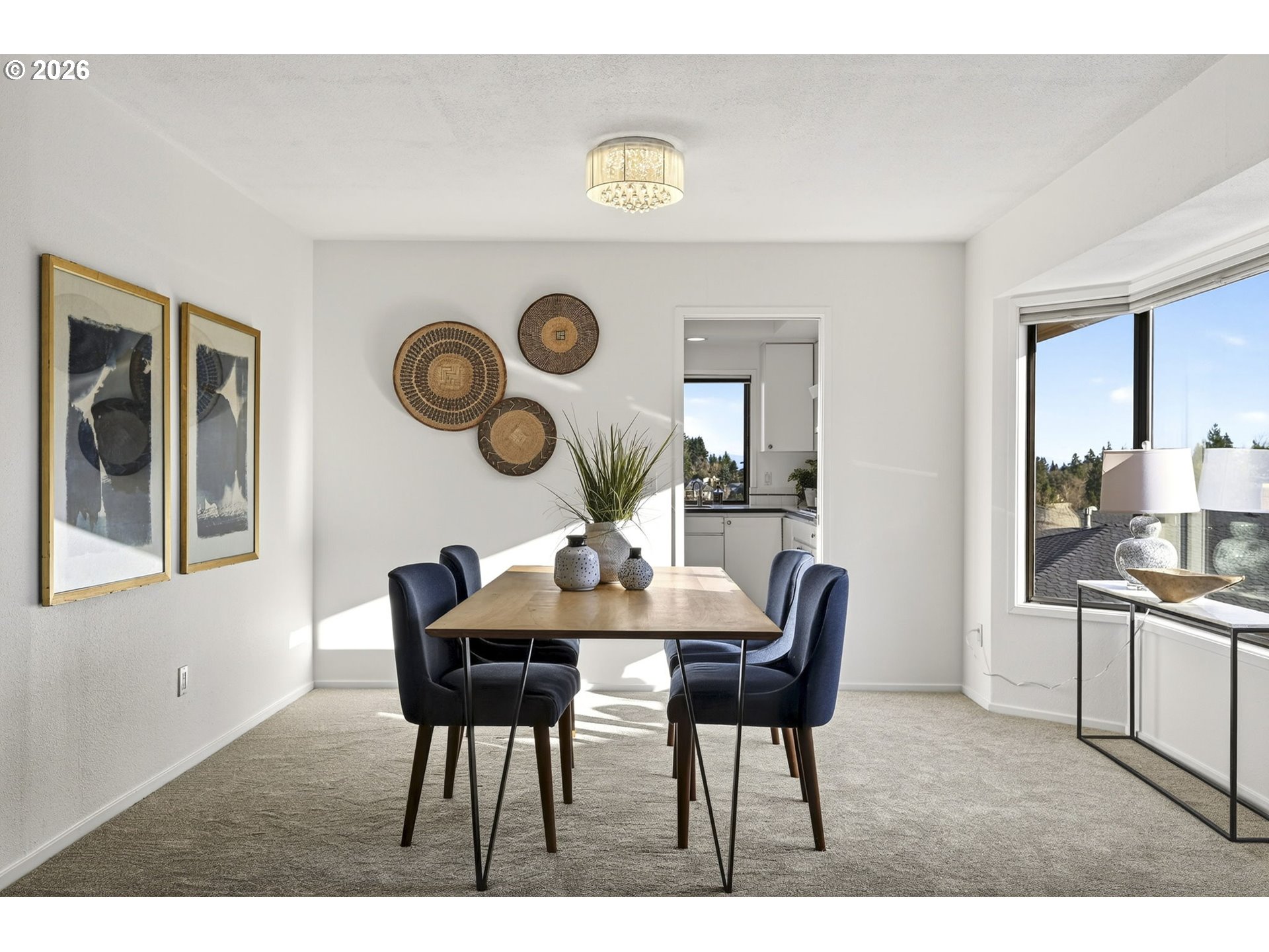 45 Southwest Condolea Court Lake Oswego, OR 97035 - Photo 7 of 23 a view of a dining room and a table and chairs