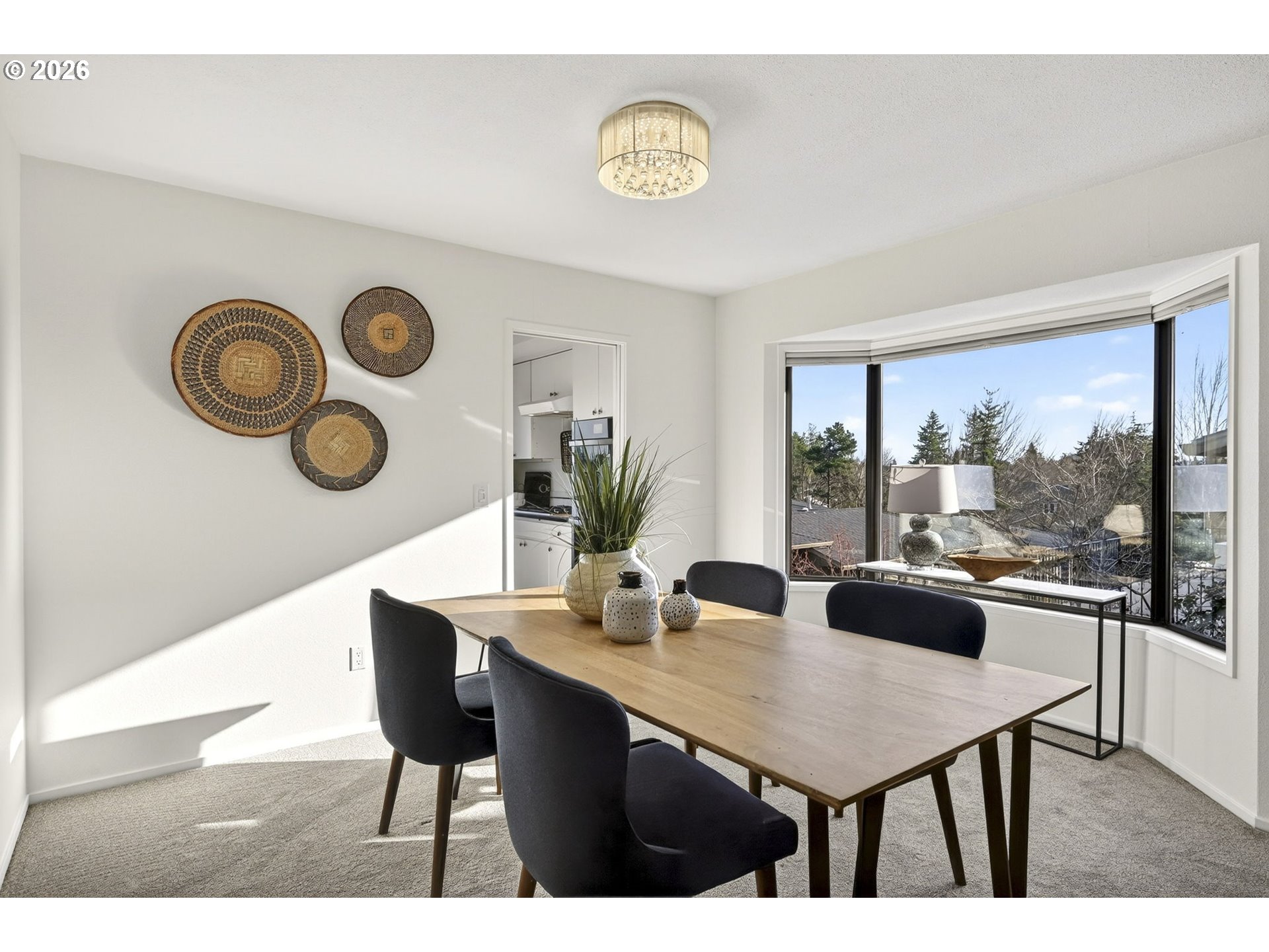 45 Southwest Condolea Court Lake Oswego, OR 97035 - Photo 8 of 23 a dining room with a table and chairs
