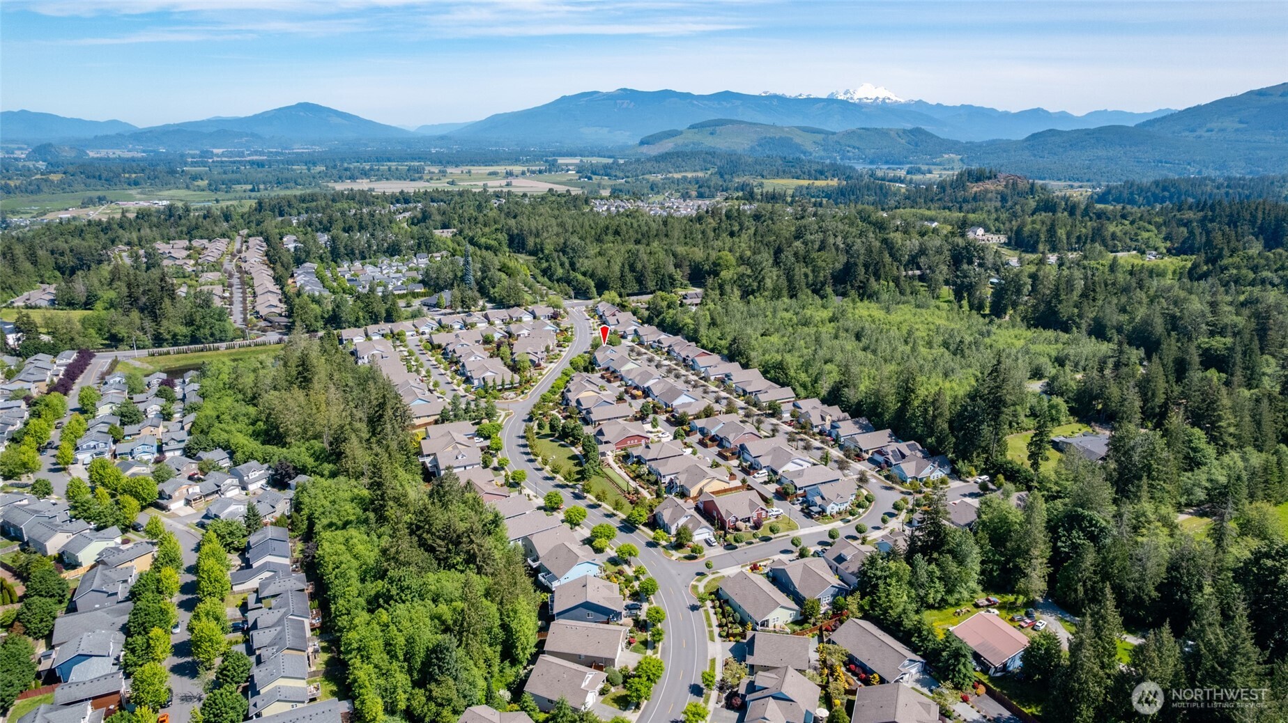 232 Sinclair Alley Mount Vernon, WA 98274 - Photo 33 of 33 a view of a lush green hillside and houses