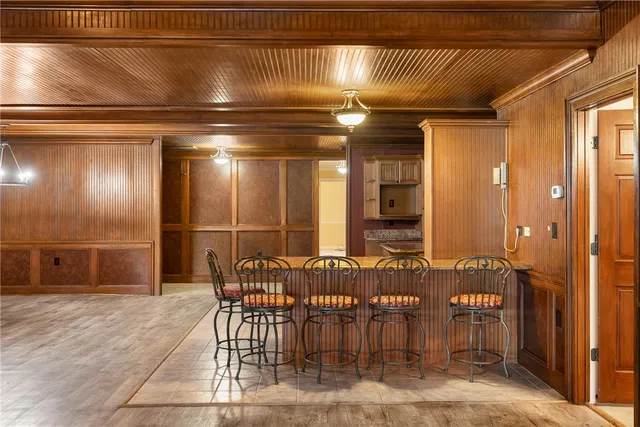 a view of a hallway with seating area