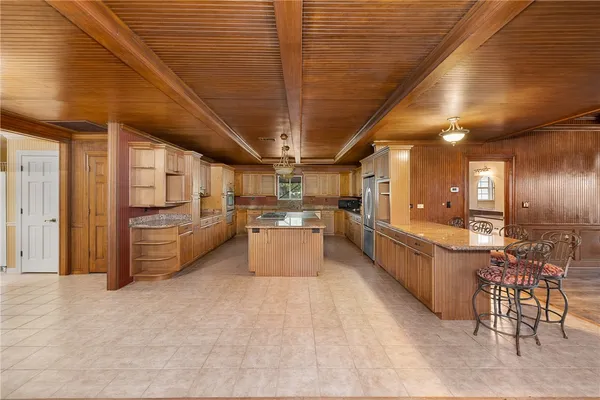 a large room with lots of wooden furniture