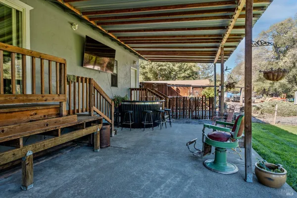 a view of deck with wooden floor and outdoor seating