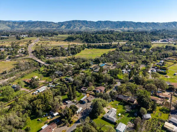 an aerial view of residential house and outdoor space